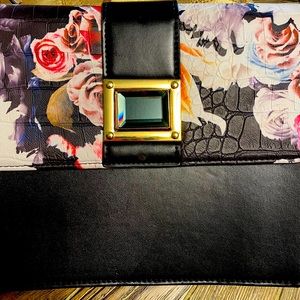 Black floral clutch! Never used. $25